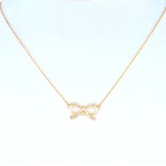 Bow Ribbon Pendant Necklace One Tone Bow Design Trendy Bow Necklace Nickel & Lead Free **Size: Approx. 16" Long + 2" Extender** Adjustable Clavicle Chain Necklace As Gift For Her, Adjustable Delicate Chain Necklace For Gifts, Elegant Adjustable Nickel-free Charm Necklaces, Adjustable Delicate Chain Necklace As Gift, Dainty 16 Inch Charm Necklace For Gift, Dainty Charm Necklace As Gift, 16 Inch Length, Dainty 16 Inch Charm Necklace As A Gift, Elegant Nickel-free Chain Necklace For Gift, Elegant Nickel-free Chain Necklace Gift