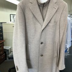 Saks Fifth Avenue Ermenegildo Zegna Trofeo Wool And Cashmere Coat In Great Condition. Luxury Beige Outerwear For Business Casual, Luxury Beige Business Casual Outerwear, Designer Beige Outerwear For Business, Luxury Beige Outerwear For Semi-formal Occasions, Luxury Long Business Sport Coat, Luxury Business Outerwear, Designer Winter Suit With Hidden Button Closure, Designer Semi-formal Sport Coat For Winter, Designer Winter Semi-formal Sport Coat