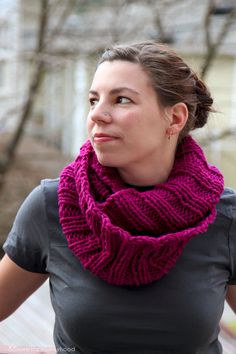 a woman wearing a purple knitted cowl with the text, the mallory cowl