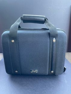 a blue bag sitting on top of a table