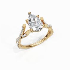 a yellow gold engagement ring with an oval cut diamond in the center and side stones