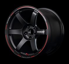 a black wheel with red stripes on it