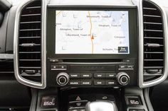 the interior of a car with gps and navigation system on it's display screen