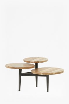 three wooden tables sitting on top of each other