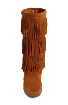 Three tiers of fringe cover the tall shaft of a flat suede boot, trimmed with whipstitching along the seams for subtle detail. Style Name:Minnetonka 3-Layer Fringe Boot. Style Number: 231508. Western Suede Fringe Boots, Western Style Suede Boots With Fringe, Western Suede Boots With Tassels, Winter Suede Boots With Tassels, Brown Fringe Winter Boots, Suede Flat Boots, Boot Style, Fringe Boots, Suede Boots