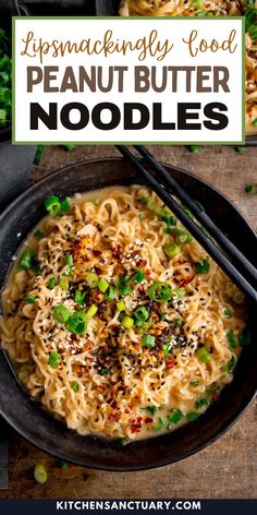 a bowl filled with noodles and topped with green onions, sesame seeds and seasoning