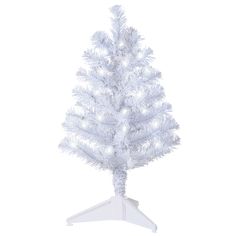 a white christmas tree with lights on it's top and stand in front of a white background