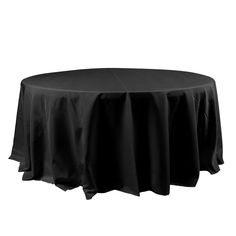 a round table with black cloth on it