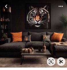 a living room filled with furniture and a tiger painting on the wall above it's head