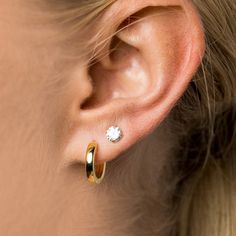 Introducing the "Polished Round Huggie Hoop Earring in Yellow Gold" these small hoop style earrings are the ultimate basic and a must-have in your jewelry collection. These hoops are such a classic, with the polished yellow gold, they give a beautiful glow to any look. You can feel comfy rocking these huggies all summer long since they are water proof and sweat proof. Paired with our "Herringbone Necklace In Yellow Gold" you have the perfect every day set to take you from day to night! This prod Bridal Earrings Chandelier, Herringbone Necklace, Sparkle Necklace, Solid Gold Earrings, Elegant Bracelet, Vermeil Jewelry, Custom Earrings, Huggie Earrings, Classic Jewelry