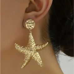 Gold Coated Woman’s Starfish Earrings Fun For The Beach , Something To Go With Your Beach Wear To Make It Look Outstanding A Great Set Of Gold Star Fish Can Do That I Only Have The One Pair So Grab Them While You Can . Nwot Gold Starfish Charm Jewelry For Party, Gold Star Earrings For Summer, Elegant Star-shaped Summer Earrings, Star Shaped Earrings For Summer, Elegant Star-shaped Earrings For Summer, Elegant Summer Star-shaped Earrings, Elegant Starfish Earrings For Summer, Elegant Summer Starfish Charm Earrings, Ocean-inspired Star Earrings For Summer