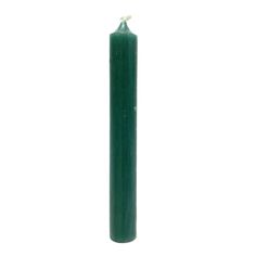 a tall green candle on a white background