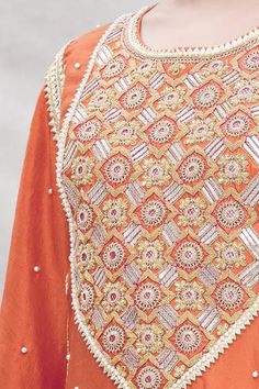 Rust kurta with floral motifs, dori patri hand work and bell sleeves. Comes with striped sharara pants and contrast tassel dupatta.
Components:3
Embroidered
Neckline:Round
Sleeve Length:Full
Fabric:Silk
Color:Orange
Bell sleeves
Striped pattern
Back keyhole
Elastic waistband
Tassel dupatta - Aza Fashions Tassel Dupatta, Sharara Pants, Kurta Sharara Set, Kurta Sharara, Silk Kurta, Sharara Set, Embroidered Neckline, Fabric Silk, Hand Work