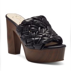 a women's black shoe with wooden heel and braided design on the side