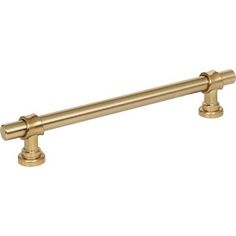 an antique brass finish pull handle on a white background