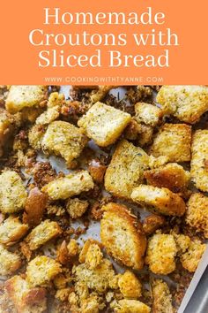 homemade croutons with sliced bread on a baking sheet