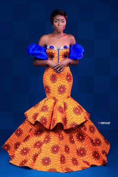 Nkem mermaid dress is original African dress for wedding, reception prom welcoming party dress made with a touch of royay blue as the sleeve and zipper at the back to fit. Ankara dress is a type of dress that is made from Ankara fabric, which is a colorful cotton fabric with various patterns and designs. Ankara fabric is also known as African wax print, Dutch wax, or African print1. Ankara dress is popular among African women, especially in Nigeria, Ghana, and other West African countries. Ankara dress can be worn for different occasions, such as weddings, parties, casual outings, and cultural events. Ankara dress can be styled in various ways, such as short dresses, long dresses, maxi dresses, midi dresses, skater dresses, kimono dresses, and more. Ankara dress can also be accessorized wi Chitenge Designs, Prom Gown With Sleeves, Graduation Dress Black, Dresses Ankara, African Theme, African Outfits, Dress Ankara, African Prom Dresses, Africa Dress