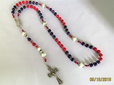 Rosary, red,white, &blue, handmade heirloom quality. A very nice seasonal or everyday Rosary with a bonus of vintage Our Father beads! White 8mm Beads Jewelry For Crafting, Red Beaded Rosary With Round Beads, Handmade Red Rosary, Blue Rosary With Round Beads For Healing, Spiritual Blue Rosary With Round Beads, Blue 108 Beads Spiritual Rosary, Pearl Rosary, Gold Snake, Gold Shimmer