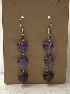 Amethyst Drop Dangle Silver Earrings -the perfect gift for anyone, lightweight -real amethyst stones tumbled to heart shapes -on a silver fish hook earring wire, but can be replaced with a butterfly backing upon request Purple Dangle Heart Earrings For Pierced Ears, Purple Heart-shaped Pierced Earrings, Purple Heart-shaped Earrings For Pierced Ears, Handmade Purple Heart Dangle Earrings, Purple Heart Beads Earrings For Gift, Handmade Purple Dangle Heart Earrings, Purple Heart-shaped Jewelry With Natural Stones, Heart Earrings Diy, Byzantine Earrings