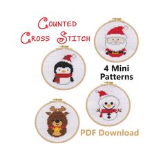 four cross stitch christmas ornaments with santa, snowman and penguin