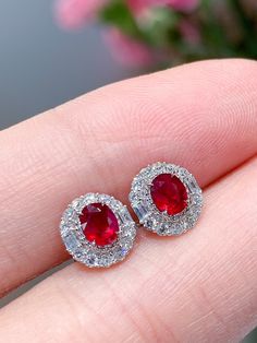 Model Number: REDAPGX028 18K white gold ruby stud earrings, classic style Metal Stamp: 18k Au750 Metals Type: 18K Gold Weight/g: 1.77 Stone: Material Rubyd/2pc and Weight/ct 0.65 Side Stone: Diamond/2 8pcs and Weight/ct 0.34 Metal Color: White Gold Setting Type: Prong Setting Gender: Unisex Fine Ruby Earrings Studs Zales, Ruby And Diamond Earrings Studs, Ruby With Diamond Earrings, Ruby Stud Earrings, Ruby Earrings Studs, Earrings Classic, Gold Beauty, Stone Material, Ruby Earrings