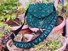 🌺Handmade Women's Shoulder Bag, Crossbody Purse  Balochi Embroidery Green Bag - Traditional Craft, Modern Style, Unique Fashion Accessory.🌺 Embrace the charm of tradition with our exquisite Handmade Balochi Embroidery Bag. This versatile bag, adorned with intricate Balochi embroidery, is a true work of art. 🌟 Features: *🌿 Versatile Design: Use it as a crossbody bag or effortlessly switch to a chic shoulder bag. *🎨 Color Options: Available in vibrant green and passionate red, adding a pop of color to any outfit. *✨ One-of-a-Kind: Each bag is uniquely handcrafted, making yours a piece like no other. 🛍️ Why You'll Love It: Indulge in the beauty of Balochi craftsmanship. This bag is more than an accessory; it's a cultural statement. The meticulous embroidery reflects the rich heritage of Green Embroidered Crossbody Shoulder Bag, Green Embroidered Bag For Everyday Use, Green Embroidered Bag For Daily Use, Embroidered Green Bag For Daily Use, Embroidered Green Shoulder Bag As Gift, Embroidered Green Shoulder Bag For Gift, Green Pouch Flap Bag With Removable Pouch, Green Flap Bag With Removable Pouch, Traditional Green Pouch Bag