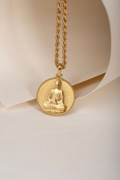 Welcome to PoshGoldJewelry, Our collection of round pendants with unique designs on top are made for both men and women. Our Buddha necklace can be personalized on the back with a custom message of your choice. Pendant Thickness: 0.6mm Rope Chain Thickness: 2.10mm Material: - 14K Real Solid Gold A hallmark (stamp) of the material of your pendant will be included on the back for certification. - Gift Box with each order! ✔️ You can contact us for the creation of your custom pendant. ✔️ Contact us Spiritual Engraved Circular Jewelry, Collectible Round Coin Pendant Jewelry, Symbolic Round Pendant Jewelry For Meditation, Personalized Spiritual Medallion Jewelry, Engraved Round Medallion Necklace As Gift, Engraved Round Medallion Necklace Gift, Jewelry With Coin Pendant As Gift, Spiritual Round Pendant Jewelry For Anniversary, Jewelry With Coin Pendant Gift