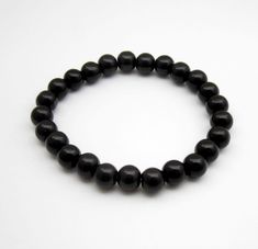 Natural Black Obsidian Beads Bracelet. Size: stretchable Black Obsidian, Beads Bracelet, Miami Beach, Labour Day, Bangle Bracelets, Jewelry Bracelets, Miami, Bangles, Accessory Gift