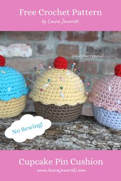 three crocheted cupcake pin cushions sitting next to each other