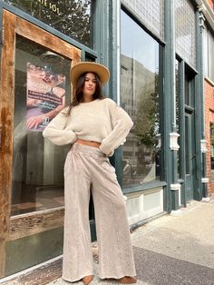 These washed brown wide-leg pants feature a soft material and a flowy, relaxed fit with two side pockets and an elastic waistband. Finsished with exposed vertical seams and a raw hem at the bottom of the pant legs. Runs slightly large. 100% Cotton Hand wash cold, lay flat to dry Lex is 5'7" and wearing a size small RETURN POLICY: 30 DAY RETURN FOR STORE CREDIT ONLY. ORIGINAL TAGS MUST BE ATTACHED TO UNWANTED ITEM FOR THE RETURN TO BE ACCEPTED. Flowy Wide Leg Pants Outfit, Flowy Wide Leg Pants, Wide Leg Pants Outfit, Pants Outfit, Java, Soft Material, Lay Flat, Leg Pants, Wide Leg Pants