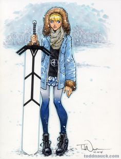 a woman standing in the snow holding a ski pole