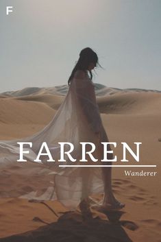 a woman is standing in the desert with her dress flowing