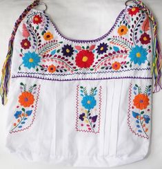 Bohemian Multicolor Embroidered Cotton Shoulder Bag, Bohemian Cotton Shoulder Bag With Multicolor Embroidery, Multicolor Embroidered Crochet Bag For Everyday, Embroidered Multicolor Crochet Bag For Everyday Use, Bohemian Shoulder Bag With Multicolor Embroidery, White Cotton Shoulder Bag With Floral Embroidery, Bohemian Cotton Bags With Multicolor Embroidery, Bohemian Cotton Bag With Multicolor Embroidery, Handmade Multicolor Embroidery Hobo Bag