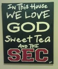 a sign that says in this house we love god, sweet tea and the sec