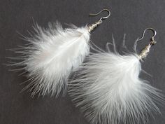 "White Marabou Feather Earrings  hand made by myself: Item name: \"Marabou Feathers\" Description:  2 White soft and fluffy marabou feathers measure approx 70mm x 30mm (almost 3\" x just over 1\"),  these hang from 925 sterling silver fish hook earwires These are so soft and fluffy and very pretty (check my other listings for marabou feathers hair bobby pins) Your new earrings will come in jewellery pouch along with little card showing item name see above:" Wind Jewelry, Feathers Earrings, Marabou Feathers, Mustard Seed Necklace, Remembrance Necklaces, Faith Necklace, Angel Earrings, Real Flower Jewelry, Peridot Earrings