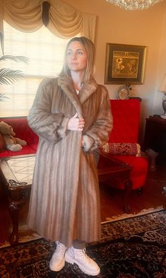 "Lovely light brown beige petite full length genuine vintage mink fur coat for your consideration ! You will love and enjoy this fabulous coat for many more winters to come. Beautiful light brown \"autumn haze\" shade is non-dyed natural coloring. The fur is silky soft, supple and just darling!  So pleasant to touch , lightweight fur in classic style! Excellent vintage condition  Size Small / Extra Small  Modern size 2-4 or a smaller 6 Please, check out the measurements: Shoulders 16\"  Bust 20\"x2 -40\" Sleeves 23\" Length 43\" Lining is taupe color satin  in excellent condition ! I hope, this is helpful, Please, let me know otherwise, Shop for your furs early and get a treasure before anyone else discovers it ! ;)  Truly a treasure for many years to come! :) These fabulous furs are an in Elegant Long Mink Outerwear, Fitted Mink Long Fur Coat, Brown Autumn, Fabulous Furs, Mink Fur Coat, Beige Light, Taupe Color, Mink Fur, Brown Beige