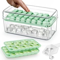 an image of a plastic container with ice cubes in it and someone's hand