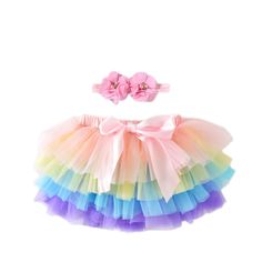 Introducing the stunning Baby Tutu Skirt with Bloomer and headband set ! This charming ensemble is designed to make your little one look absolutely precious and ready for any special occasion. The skirt features multiple layers of soft and fluffy tulle fabric. The layers create a voluminous and playful look, perfect for twirling and capturing hearts. The attached bloomer ensures a comfortable and secure fit for your baby. It provides coverage and allows for easy movement, making it suitable for Newborn Photography Outfit, Gonna In Tulle, 1st Birthday Tutu, Rainbow Tutu, Princess Skirt, Baby Tutu, Flower Girl Tutu, Pink Tutu