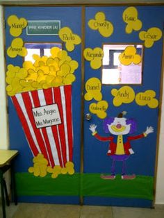 a door decorated with an image of a clown and a popcorn bucket on the front