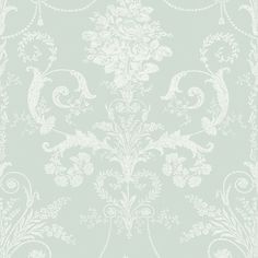 a light green wallpaper with white flowers and vines on the bottom half of it