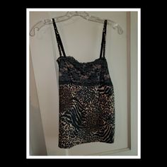 Animal Stripe/Spot Camisole. Shades Of Tan/Brown Behind Black Tiger Stripe/Leopard Spot Print. Black Lace On Front. Black Adjustable Straps. Size M (8-10). Nwt-Never Worn. Fitted Leopard Print Cami Tank Top, Fitted Leopard Print Camisole, Fitted Leopard Print Camisole For Summer, Fitted Leopard Print Camisole With Spaghetti Straps, Leopard Print Sleeveless Top With Built-in Bra, Sleeveless Leopard Print Top With Built-in Bra, Leopard Print Top With Built-in Bra For Night Out, Stretch Leopard Print Tops With Built-in Bra, Sleeveless Leopard Print Top For Night Out