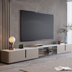 a large flat screen tv mounted to the side of a wall in a living room