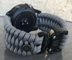 "FREE USPS PRIORITY MAIL SHIPPING FOR DOMESTIC US ORDERS (Includes U.S. Military APO/FPO Address Overseas) Thank you for visiting our shop \"Cording 2U\". A veteran owned business. Handcrafted Paracord wearables customized \"According To You\". Handcrafted with 100% Nylon Paracord \"MADE IN USA\" Our Products include: 🔹Custom handcrafted watch bands according to your wrist size, style, and color of choice. If you don't see it in our page yet, please contact us and we can discuss your options. ? Durable Silver Watch Bands For Outdoor, Silver Durable Watch Bands For Outdoor, Outdoor Durable Silver Watch Bands, Paracord Watchband, Garmin Marq, Paracord Watch, Garmin Fenix, Veteran Owned Business, 550 Paracord