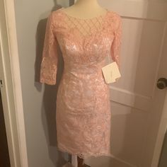 Lace Mid Sleeve Dress Rose Gold/ With White Liner Underneath Built In Padding In Chest Area Full Length 39’ Sleeves Length 14’ Pit To Pit 18 1/2 ‘ Brand New With Tags Selling Because I Can’t Return Bought For A Wedding Never Worn Size Small Comes With Chiffon Cover Up Spring Lace Dress For Mother Of The Bride, Spring Mother Of The Bride Lace Dress, Pink Fitted Dress For Mother Of The Bride, Pink Fitted Lace Dress For Formal Occasions, Fitted Lace Dress For Spring Formal, Fancy Maxi Dress, Full Sequin Dress, Black Ribbed Dress, Gold Formal Dress