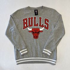 Vintage Chicago Bulls Sweatshirt Size L Color Grey | eBay Throwback Long Sleeve T-shirt For Sports Events, Throwback Long Sleeve T-shirt For College, Varsity Long Sleeve Top With Logo Print, Urban Crew Neck Tops For Sports Season, Casual Sweatshirt With Three Stripes For Sports Season, Athletic Heather Tops With Ribbed Cuffs For Streetwear, Casual Sweats With Ribbed Cuffs For Sports Events, Throwback Long Sleeve Letter Print T-shirt, Gray Tops With Ribbed Cuffs For Sports Season