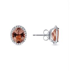 This item is made to order and takes 4-6 Weeks to complete. Materials ﻿Gold, Diamonds Description Up for sale is a beautiful pair of Diamond Halo Oval Morganite Earrings. Total Diamond Weight: 0.15 Carats Total Morganite Weight: 3.29 Carats Color F-G Clarity SI Specifications:-Model #: OVMO1155-Metal Type: Rose, White, or Yellow Gold-Metal Purity: 14K-Weight Total: 1.8 Grams-Diamond Weight: Approx. 0.15 carats-Morganite Weight: Approx. 3.29 Carats-Color: F-G-Clarity: SI Brief Overview: -Free Siz Luxury Oval Diamond Earrings With Gemstones, Formal Oval Diamond Earrings With Gemstones, Oval Halo Diamond Earrings, Oval Halo Setting Earrings For Formal Occasions, Formal Oval Halo Setting Earrings, Formal Oval Earrings With Halo Setting, Oval Halo Earrings For Formal Occasions, Formal Oval Earrings With Diamond Accents, Formal Oval Halo Earrings