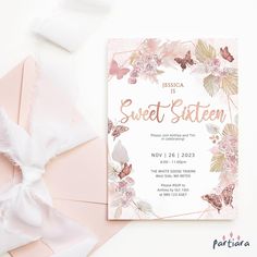 a pink and gold sweet sixteen birthday party with flowers, leaves and butterflies on it