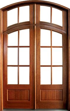 an open wooden door with two sidelights on the top and bottom, in front of a white background