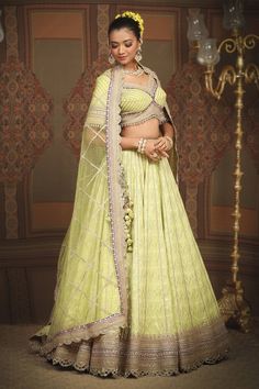 Light pea green cotton shimmer chanderi lehenga with attached cancan, geometric patterns, intricate gota, dori and badla work and purple broad border. Comes with padded, gota work blouse and lace border net dupatta. - Aza Fashions Badla Work, Chanderi Lehenga, Green Lehenga, Gota Work, Net Dupatta, Lace Border, Work Blouse, Green Cotton, Geometric Patterns