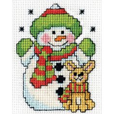 a cross stitch pattern with a snowman and dog